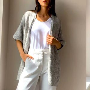 ARITZIA oversized sweater with a cape-inspired silhouette.